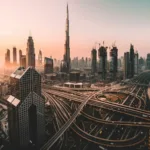 Dubai skyline at dusk, seen across the water