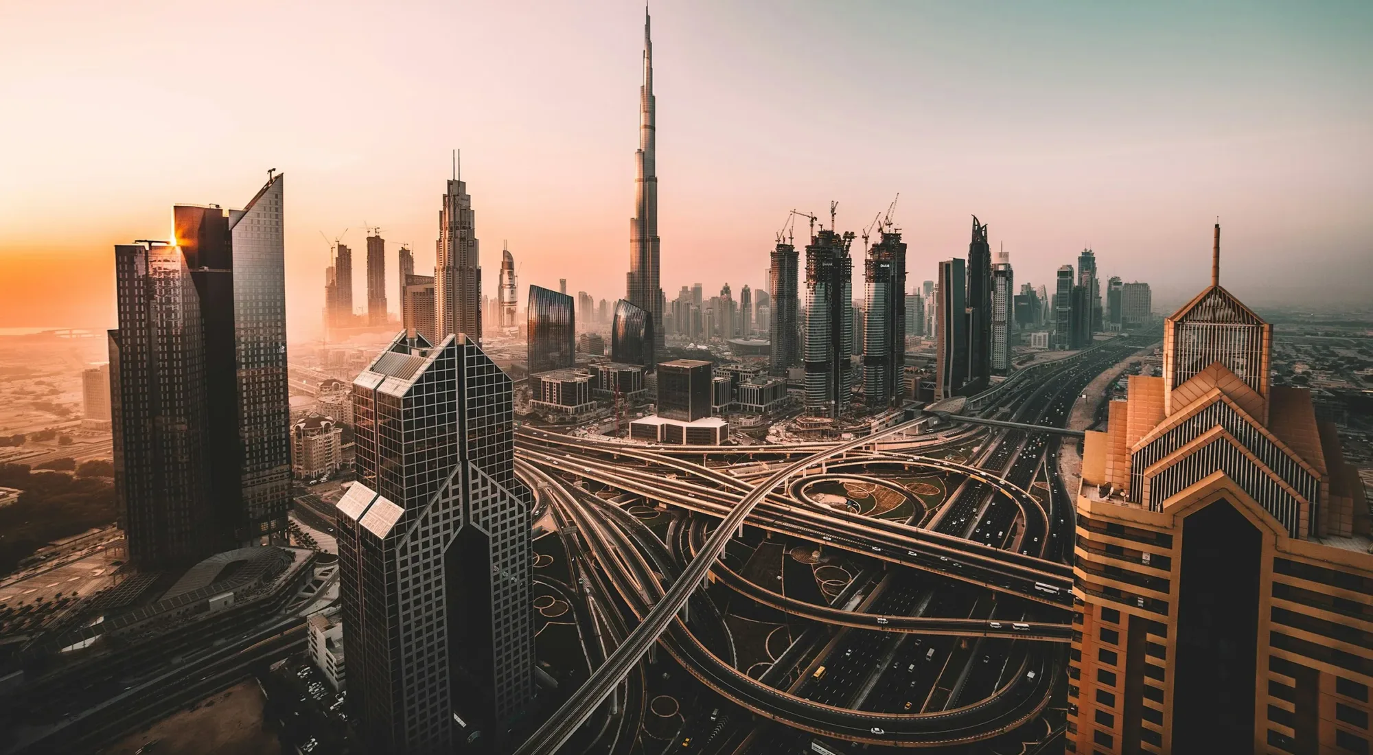 Dubai skyline at dusk, seen across the water